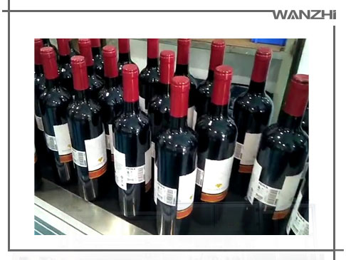 全自動(dòng)紅酒定位貼標(biāo)機(jī)_ 紅酒自動(dòng)貼標(biāo)機(jī)_東莞市萬志自動(dòng)化科技有限公司